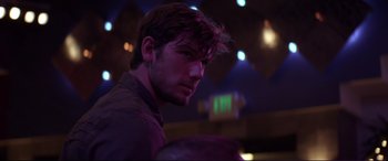 Movie still from “Magic Mike” (2012), directed by Steven Soderbergh – A person in a dark room; Close Up shot, Over the shoulder angle