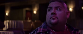 Movie still from “Magic Mike” (2012), directed by Steven Soderbergh – A man's face in a dark room; Close Up shot, Low angle