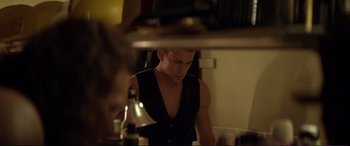 Movie still from “Magic Mike” (2012), directed by Steven Soderbergh – A man looking in the mirror in front of a mirror; Medium shot, Over the shoulder angle