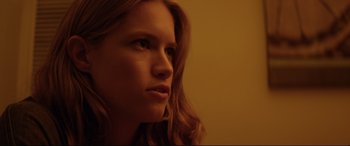 Movie still from “Magic Mike” (2012), directed by Steven Soderbergh – A person with long hair; Close Up shot, Low angle