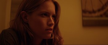 Movie still from “Magic Mike” (2012), directed by Steven Soderbergh – A person with long hair; Close Up shot, Low angle