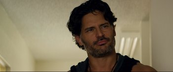 Movie still from “Magic Mike XXL” (2015), directed by Gregory Jacobs – A person with a beard; Close Up shot, Over the shoulder angle