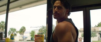 Movie still from “Magic Mike XXL” (2015), directed by Gregory Jacobs – A person in a gym; Close Up shot, Over the shoulder angle