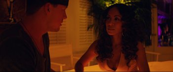Movie still from “Magic Mike XXL” (2015), directed by Gregory Jacobs – A man and a woman sitting at a dinner table; Close Up shot, Over the shoulder angle