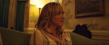 Movie still from “Magic Mike XXL” (2015), directed by Gregory Jacobs – A person sitting on a couch; Close Up shot, Over the shoulder angle