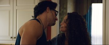 Movie still from “Magic Mike XXL” (2015), directed by Gregory Jacobs – A man and a woman face to face in front of a wall; Close Up shot, Over the shoulder angle