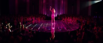 Movie still from “Magic Mike XXL” (2015), directed by Gregory Jacobs – A woman in a white dress is on a stage; Wide shot, Low angle