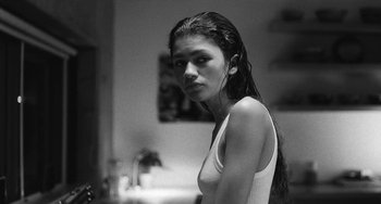 Movie still from “Malcolm & Marie” (2021), directed by Sam Levinson – Black and white photograph of a woman with wet hair; Close Up shot, Low angle