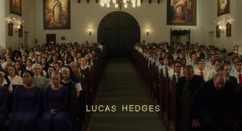 Movie still from “Lady Bird” (2017), directed by Greta Gerwig – A large group of people in a church; Extreme Wide shot, High angle