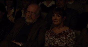 Movie still from “Lady Bird” (2017), directed by Greta Gerwig – A man and a woman sitting next to each other; Close Up shot, High angle