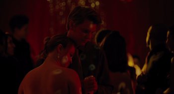 Movie still from “Lady Bird” (2017), directed by Greta Gerwig – A man and a woman standing next to each other; Medium shot, Low angle