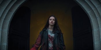 Movie still from “Marianne” (2019), created by Samuel Bodin – Medium shot, Low angle