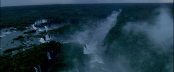 Movie still from “Miami Vice” (2006), directed by Michael Mann – A view of a waterfall from a helicopter; Extreme Wide shot, Overhead angle