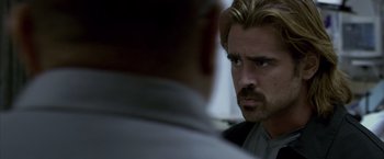 Movie still from “Miami Vice” (2006), directed by Michael Mann – A person looking at another person; Close Up shot, Over the shoulder angle