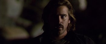 Movie still from “Miami Vice” (2006), directed by Michael Mann – A person with long hair; Close Up shot, Over the shoulder angle