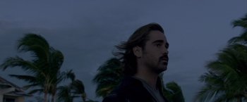 Movie still from “Miami Vice” (2006), directed by Michael Mann – A person with long hair; Close Up shot, Low angle