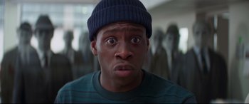 Movie still from “Last Night in Soho” (2021), directed by Edgar Wright – A person wearing a hat; Close Up shot, Overhead angle