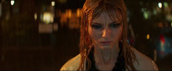 Movie still from “Last Night in Soho” (2021), directed by Edgar Wright – A person with wet hair; Close Up shot, Over the shoulder angle