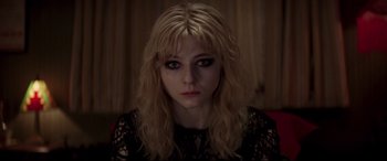 Movie still from “Last Night in Soho” (2021), directed by Edgar Wright – A person with long blonde hair; Close Up shot, High angle