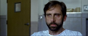 Movie still from “Little Miss Sunshine” (2006), directed by Jonathan Dayton – A person wearing a hospital gown; Close Up shot, High angle