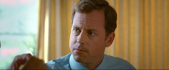 Movie still from “Little Miss Sunshine” (2006), directed by Jonathan Dayton – A person wearing a shirt and tie; Close Up shot, Over the shoulder angle