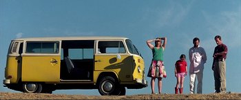 Movie still from “Little Miss Sunshine” (2006), directed by Jonathan Dayton – A woman standing next to a yellow van; Wide shot, Low angle