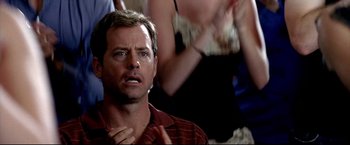 Movie still from “Little Miss Sunshine” (2006), directed by Jonathan Dayton – A person wearing a red and white striped shirt; Close Up shot, Over the shoulder angle