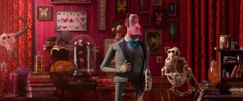 Movie still from “Missing Link” (2019), directed by Chris Butler – A man in a suit and tie standing next to a skeleton; Medium shot, Over the shoulder angle