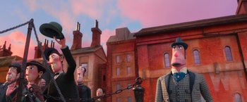 Movie still from “Missing Link” (2019), directed by Chris Butler – A group of cartoon characters standing next to each other in front of a building; Medium shot, Low angle