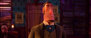 Movie still from “Missing Link” (2019), directed by Chris Butler – A man in a suit and tie with a fake mustache; Close Up shot, Low angle