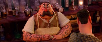 Movie still from “Missing Link” (2019), directed by Chris Butler – A man with tattoos and a mustache on his face; Medium shot, High angle