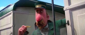 Movie still from “Missing Link” (2019), directed by Chris Butler – A man with a mustache and a hat is holding a cigarette; Close Up shot, Low angle
