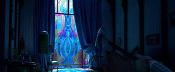 Movie still from “Missing Link” (2019), directed by Chris Butler – A room that has a stained glass window in it; Extreme Wide shot, Low angle