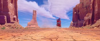 Movie still from “Missing Link” (2019), directed by Chris Butler – An image of a truck in the middle of a desert; Extreme Wide shot, Low angle