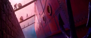 Movie still from “Missing Link” (2019), directed by Chris Butler – View of a large metal structure with a person walking on it; Extreme Wide shot, Low angle