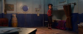 Movie still from “Missing Link” (2019), directed by Chris Butler – A woman standing in front of a mirror in a room; Wide shot, Low angle