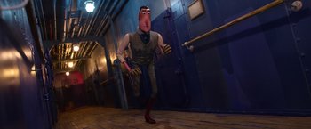 Movie still from “Missing Link” (2019), directed by Chris Butler – A man with a fake nose is walking down a hallway; Wide shot, High angle