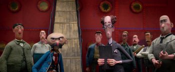 Movie still from “Missing Link” (2019), directed by Chris Butler – A group of people standing next to each other in a room; Medium shot, Low angle