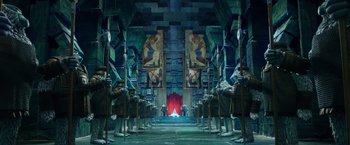 Movie still from “Missing Link” (2019), directed by Chris Butler – A group of people standing in front of a red curtain; Extreme Wide shot, Low angle