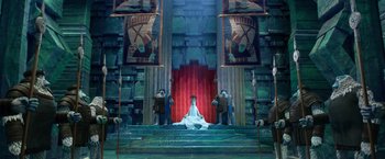 Movie still from “Missing Link” (2019), directed by Chris Butler – A woman sitting in a chair in front of a red throne; Wide shot, Low angle