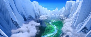 Movie still from “Missing Link” (2019), directed by Chris Butler – An aerial view of a river flowing through a mountain valley; Extreme Wide shot, Overhead angle