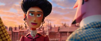 Movie still from “Missing Link” (2019), directed by Chris Butler – A doll's face in front of a city skyline; Close Up shot, Over the shoulder angle