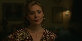 Movie still from “Love & Death” (2023), directed by Clark Johnson – Close Up shot, Over the shoulder angle