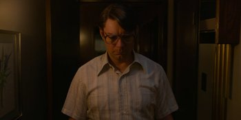 Movie still from “Love & Death” (2023), directed by Clark Johnson – Medium shot, Low angle