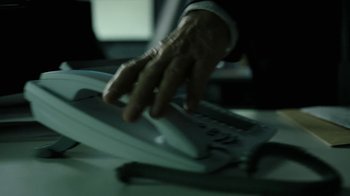Movie still from “Money Heist” (2017), created by Álex Pina – A person is typing on a white keyboard; Extreme Close Up shot, High angle