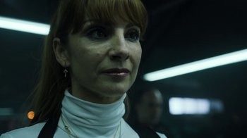 Movie still from “Money Heist” (2017), created by Álex Pina – A person wearing a white shirt; Close Up shot, Low angle