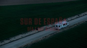 Movie still from “Money Heist” (2017), created by Álex Pina – An aerial view of an rv driving down a road; Extreme Wide shot, High angle