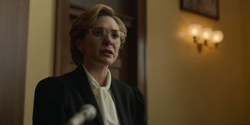 Movie still from “Love & Death” (2023), directed by Clark Johnson – Close Up shot, Low angle