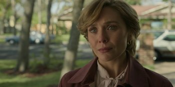 Movie still from “Love & Death” (2023), directed by Clark Johnson – Close Up shot, Over the shoulder angle