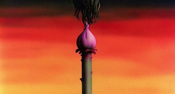 Movie still from “Life of Brian” (1979), directed by Terry Jones – An onion on top of a green pole with red sky in the background; Extreme Wide shot, Low angle